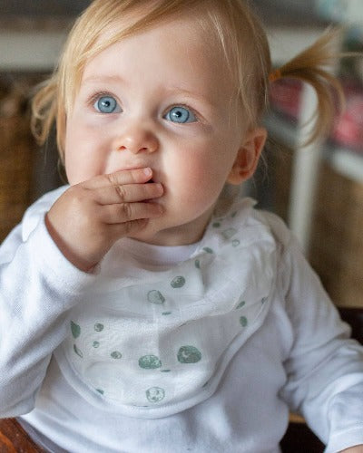 toddler wearing bamboo bib