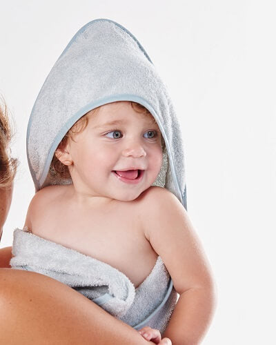baby in hooded towel