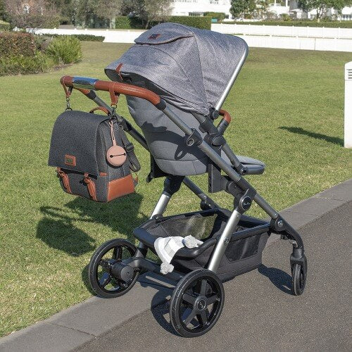 pram with silicone dummy holder attached